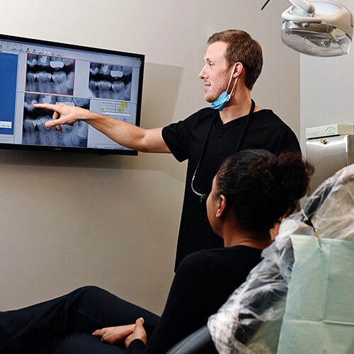 Image of your dentist in Greensboro using modern technology 